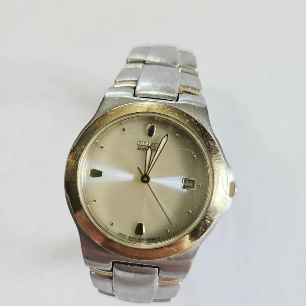 Citizen Eco-Drive Mens Date Watch Two Tone Stainless Champagne E111